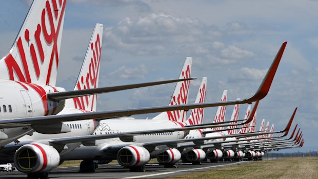 Grounded Virgin Australia aircraft parked at Brisbane Airport.