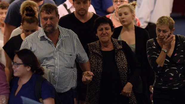 The parents of Phillip Hughes, Greg and Virginia, leave St Vincent's Hospital on Thursday. 