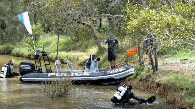 Police and police divers search for clues in the ongoing investigation into Tiahleigh's murder search the river where her body was found.