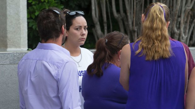 Tiahleigh Palmer's mother Cindy waits with supporters outside court earlier this week.