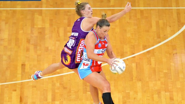 Kim Green had the early chocolates in her battle against Firebirds wing defence Gabi Simpson.