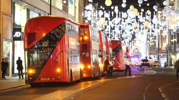 Buses are parked on Oxford Street after the area was evacuated.