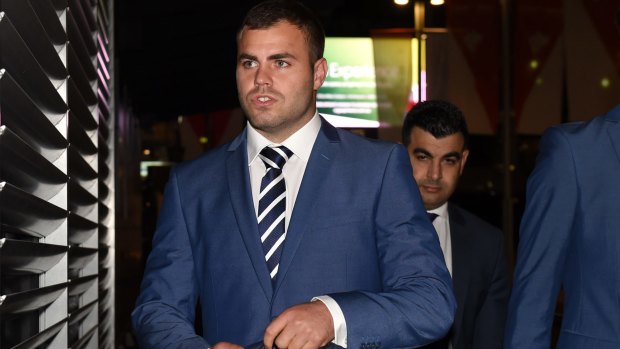 Reflex action? Cronulla Sharks forward Wade Graham arrives at League Central for his hearing on Wednesday night.