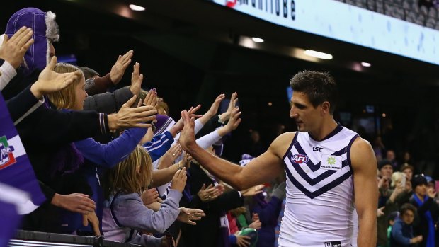 Fremantle captain Matthew Pavlich with fans after Sunday's win.