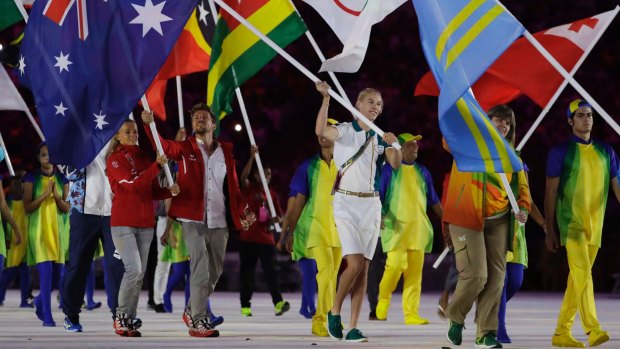 Kim Brennan carries the flag of Australia during the closing ceremony in the Maracana stadium at the 2016 Summer Olympics in Rio de Janeiro, Brazil.