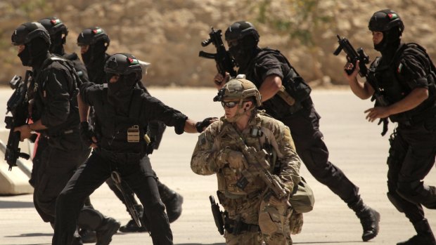 Special operations forces from Iraq, Jordan and the US conduct an exercise at the King Abdullah Special Operations Training Centre in Amman in 2013. A Jordanian officer went on a shooting spree at the centre on Monday.