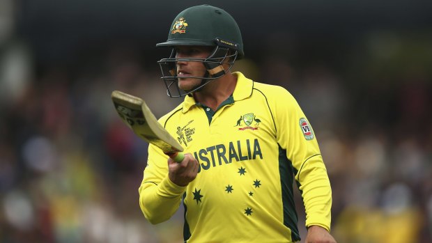 Lacking form: Aaron Finch walks back after being dismissed for 20 against Scotland in Australia's last group match.