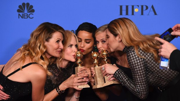 Laura Dern, from left, Nicole Kidman, Zoe Kravitz, Reese Witherspoon and Shailene Woodley pose in the press room with the award for best television limited series or motion picture made for television for "Big Little Lies" at the 75th annual Golden Globe Awards at the Beverly Hilton Hotel on Sunday, Jan. 7, 2018, in Beverly Hills, California.