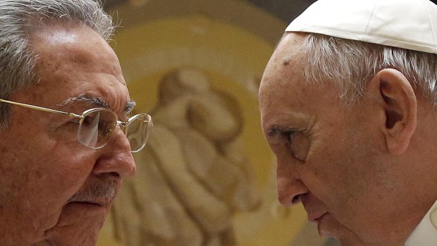 Pope Francis (right) meets Cuban President Raul Castro during a private audience at the Vatican on Sunday.