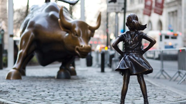 "Charging Bull" and "Fearless Girl" face off against each other in New York.