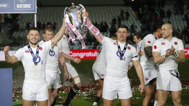Victorious: England's Danny Care and Ben Youngs celebrate after the Six Nations win over France at the Stade de France.