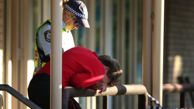 Police at the scene of a shooting outside Warners Bay Post Office on Wednesday afternoon.