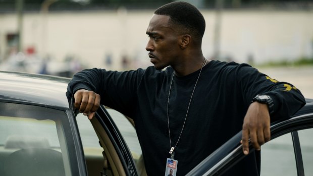 Anthony Mackie plays crooked cop Marcus Belmont in <i>Triple 9</i>.