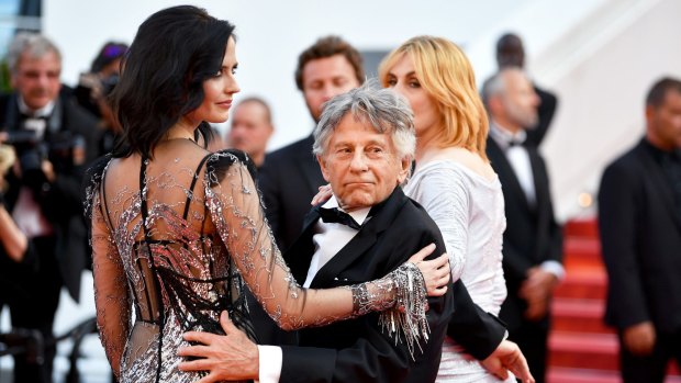 Actor Eva Green, director Roman Polanski and Emmanuelle Seigner attend the Based on a True Story screening at Cannes on Saturday.