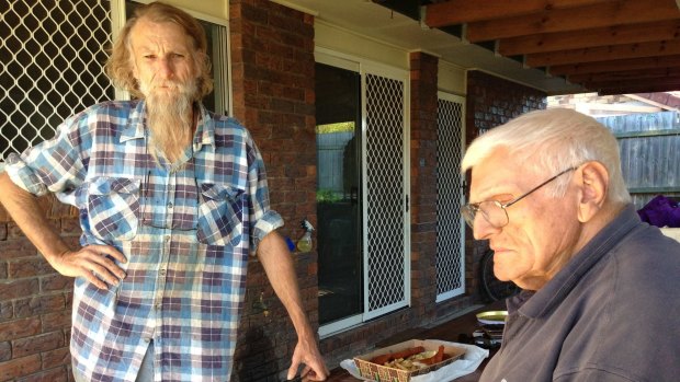 Deception Bay residents Jon Cuffe and his father Tom Cuffe speak out as class action begins against rail construction.