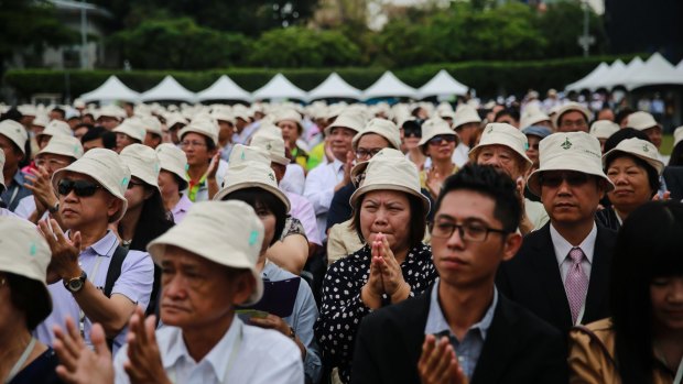 Attendees applaud during the inauguration ceremony of Tsai Ing-wen at the Presidential Palace in Taipei on Friday.