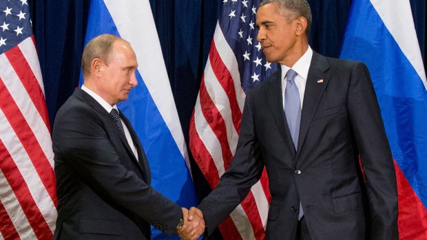 Russian President Vladimir Putin and US President Barack Obama exchange a terse handshake at the United Nations headquarters in New York.