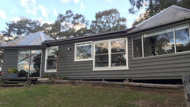 The cottage at Cooks Co-op, Sackville, is perched high above the Hawkesbury River.