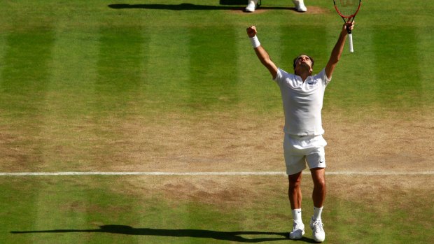 Perfect Swiss timing: Roger Federer celebrates victory over Marin Cilic.