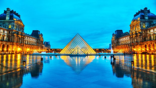 The Louvre Pyramid in Paris, France. It serves as the main entrance to the Louvre Museum. 