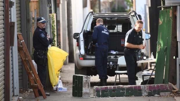 Police search a property in Surry Hills following the NSW Joint Counter Terrorism team raids throughout Sydney suburbs. 