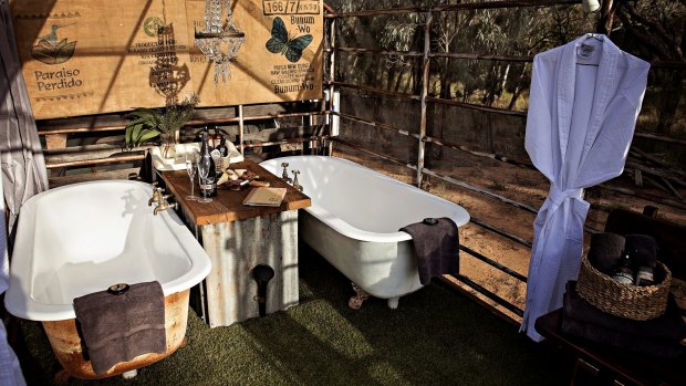 Callubri Station owners Angie and Mike Armstrong have rigged up a splendid antique rustic version of moon-bathing using an old truck trailer in a wildly overgrown paddock.