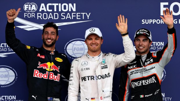 Happy trio: Top three qualifiers Daniel Ricciardo, Nico Rosberg and Sergio Perez.