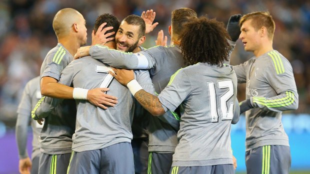 Cristiano Ronaldo is congratulated by his Real Madrid team mates after scoring the second goal.