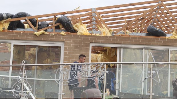 A home on Prince Charles Parade in Kurnell that lost its roof as the tornado tore through the suburb.