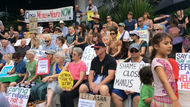 Supporters of the hospital's decision not to release a baby girl back to detention gathered outside on Saturday. 