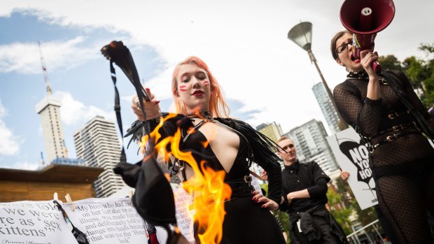 Ms Rodgers and Ms Bellentina burn a bra from Honey Birdette