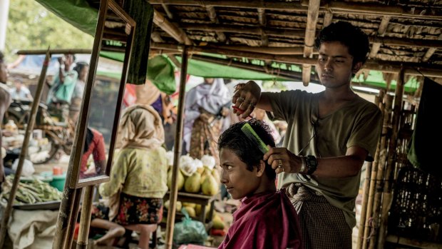A barbershop in an area where several camps have been set up for Rohingya refugees on the edge of Sittwe.