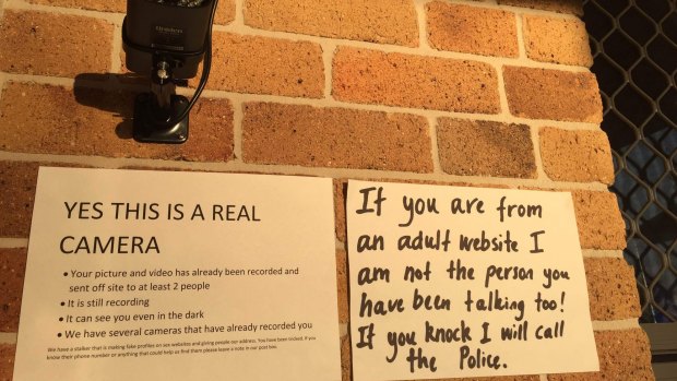 Signs and security put up by Robyn Night and her husband in response to dozens of visits from men expecting sex.
