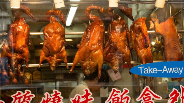 Peking duck in the Kowloon district of Hong Kong, a city that offers food and shopping for every budget.
