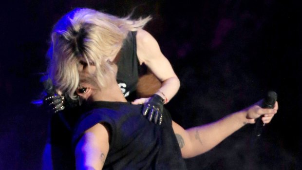 Madonna and Drake kiss onstage at the 2015 Coachella Valley Music & Arts Festival.