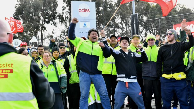 Workers picket a cold storage warehouse that supplies Coles on Wednesday.