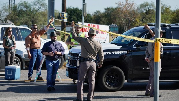 Officers man a barricade near the First Baptist Church of Sutherland Springs.