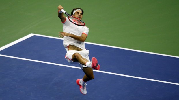 Swiss master: Roger Federer returns a shot to Stan Wawrinka during the semi-final win over his countryman.