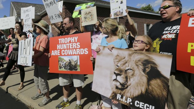 Protesters outside Walter Palmer's dental office in Bloomington, Minnesota.