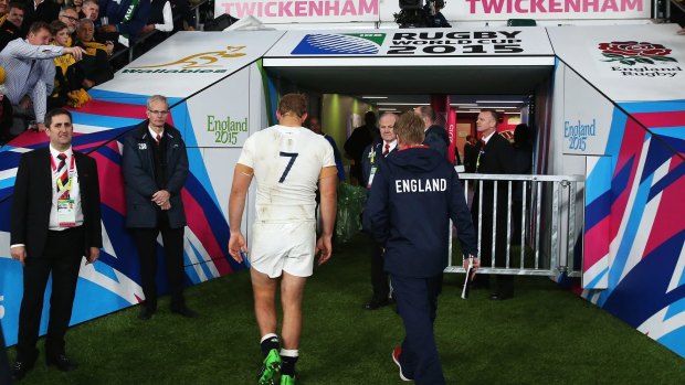 End of the road: Chris Robshaw of England walks off the pitch, his side out of the World Cup.