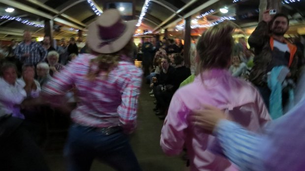 Line dancing at the Calcutta at the Outback Pioneer Hotel.