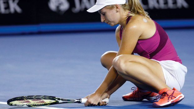 Daria Gavrilova of Australia rests on the court during her fourth round match against Carla Suarez Navarro of Spain at the Australian Open.