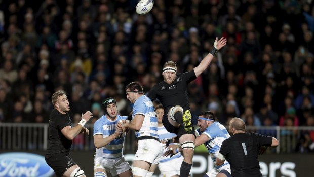 Kieran Read of New Zealand's All Blacks contests the ball with Argentina's Manuel Carizza during their Rugby Championship match at AMI Stadium in Christchurch.