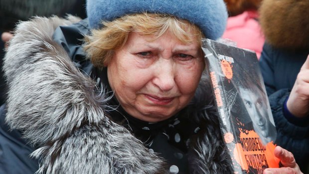 A mourner at the site where Boris Nemtsov was murdered.