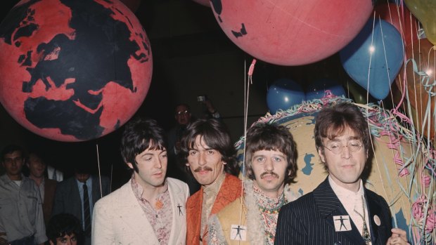 The Beatles, at the EMI studios in Abbey Road, prepare for <i>Our World.</i>