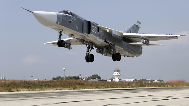 A Russian SU-24M jet fighter takes off from Hmeimim airbase in Syria.