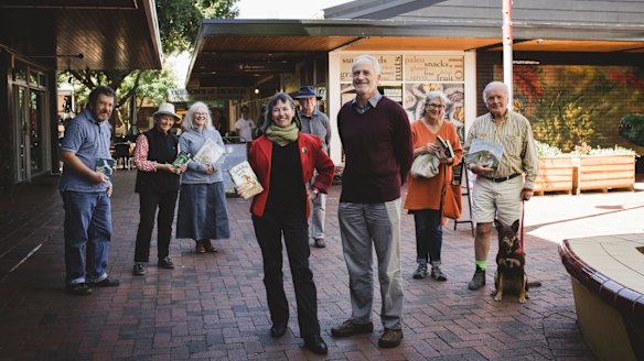 It's been one year since the ACAT tribunal retired to consider their appeal against the redevelopment of a Dickson car park into a Coles supermarket and apartment complex. Front, Jane Goffman and Ron Brent. Behind, Denis O'Brien, Jacqui Pinkava, Rosemary Urquhart, Paul Costagan, Robin d'Arcy, and John Carroll. 