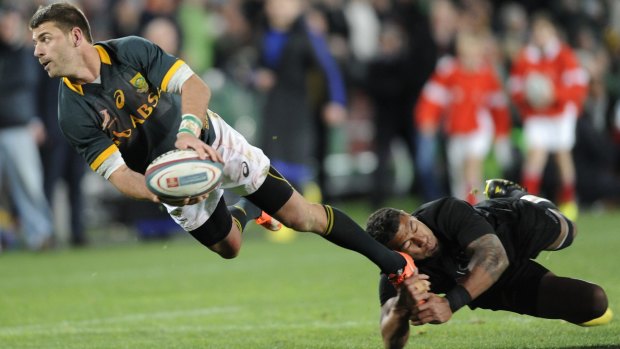 Grass cutter: Willie le Roux of South Africa is tackled by Charles Piutau.