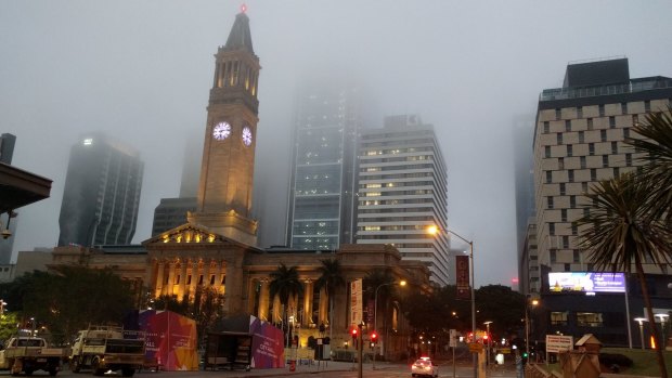 Fog has blanketed the Brisbane CBD for the third time in a week.