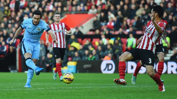 Manchester City substitute Frank Lampard beats the boot of Southampton's Maya Yoshida to score at St Mary's on Sunday.